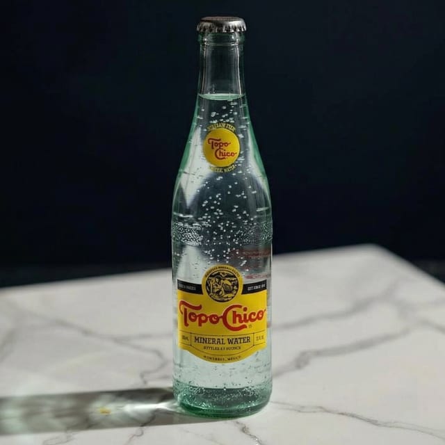 Topo Chico Mineral Water.